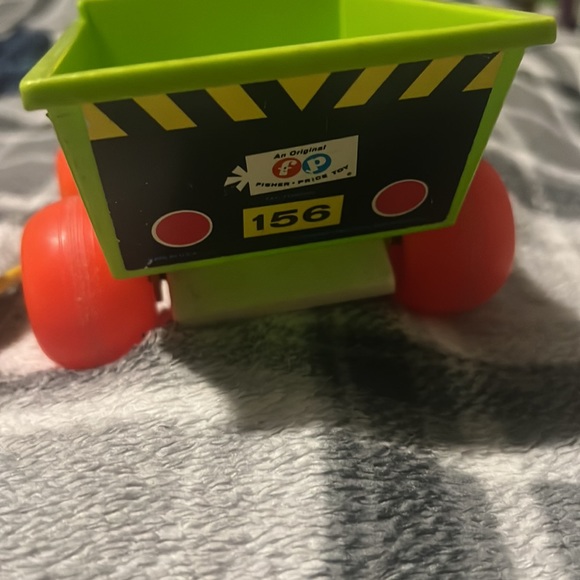 FisherPrice Toys Fisher Price Jiffy Dump Truck Pull Toy 56 Vintage